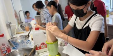 親子齊聚煎傳統木瓜粄、現打木瓜牛奶 食農料理體驗 飄香黃埔客站